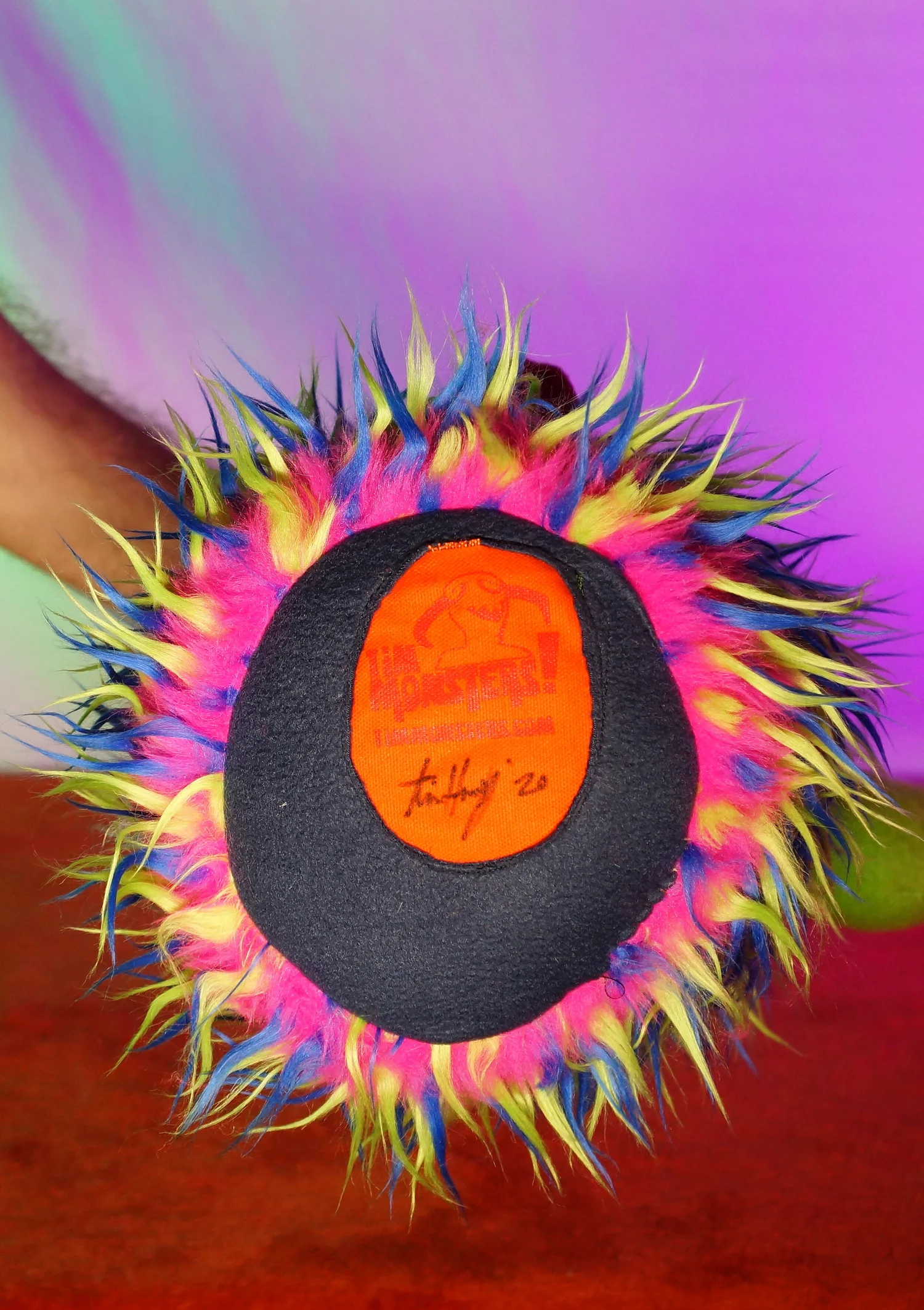 LARGE MULTI COLORED TWO EYED MONSTER WITH HORNS & POCKET MOUTH